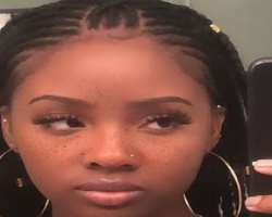 She has about seven piercings including one in her nose and three each in her ears.